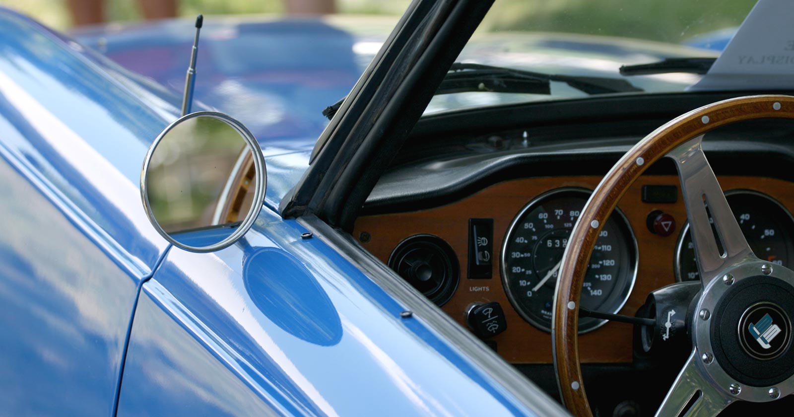 Classic car window and dashboard